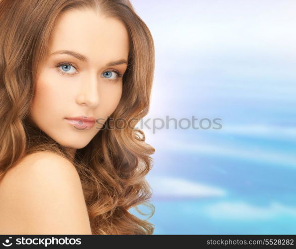 beauty and health concept - face and shoulders of beautiful woman