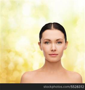 beauty and health concept - face and shoulders of beautiful woman