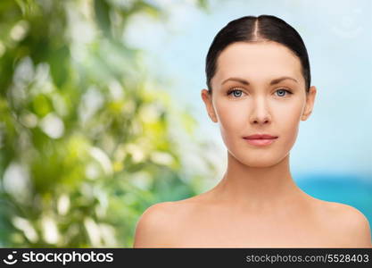 beauty and health concept - face and shoulders of beautiful woman