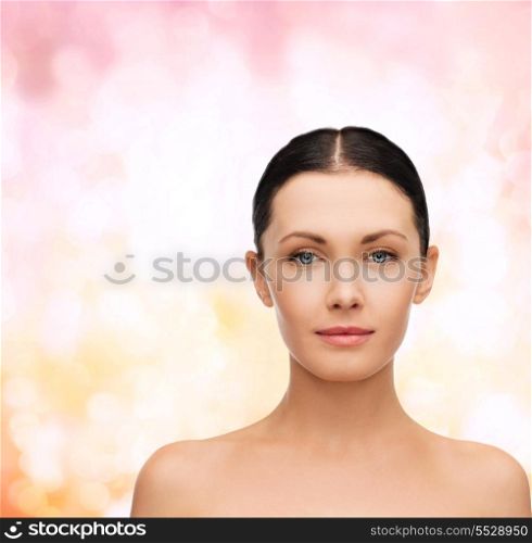 beauty and health concept - face and shoulders of beautiful woman