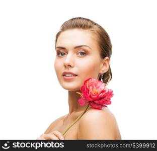beauty and jewelry - woman with diamond earrings and flower