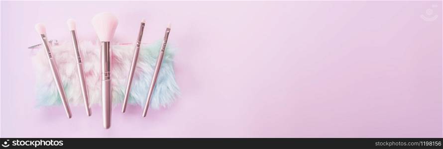 Beauty and Make up concept from Makeup tools and blush brush on pink background for Advertising sale products and Website where you place banner ads.