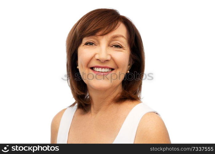 beauty and old people concept - portrait of smiling senior woman over white background. portrait of smiling senior woman over white