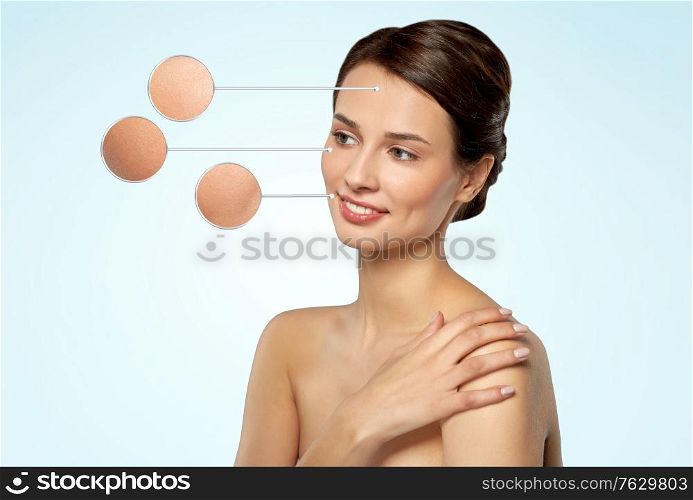 beauty and people concept - beautiful young woman with face skin in zoomed pointers over blue background. young woman with face skin in zoomed pointers