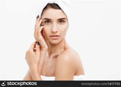 Beauty and Skin care concept - Close up Beautiful Young Woman touching her skin.. Beauty and Skin care concept - Close up Beautiful Young Woman touching her skin