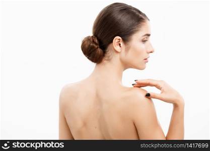 Beauty and spa concept - Charming young woman with perfect clear skin over white background. Beauty and spa concept - Charming young woman with perfect clear skin over white background.