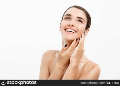 Beauty and spa concept - Charming young woman with perfect clear skin over white background. Beauty and spa concept - Charming young woman with perfect clear skin over white background.