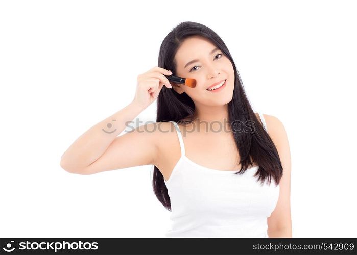 Beauty asian woman applying make up with brush of cheek isolated on white background, beautiful of girl holding blusher, skincare and cosmetic concept.
