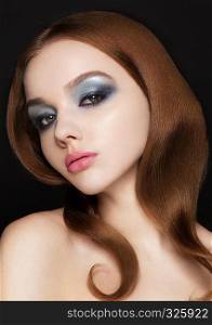 Beauty blue eyes pink lips makeup fashion model on black background