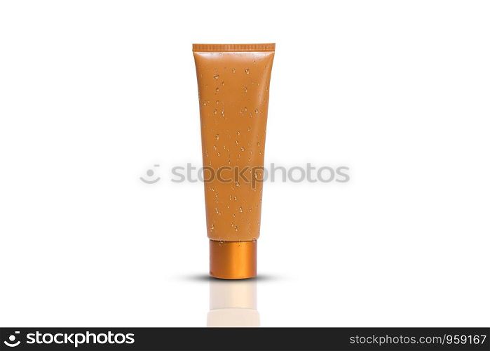 Beauty care cream or gel plastic package with water drops on white background,Blank orange cosmetic tube design mockup