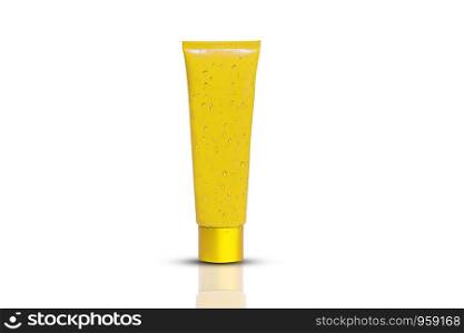 Beauty care cream or gel plastic package with water drops on white background,Blank golden cosmetic tube design mockup