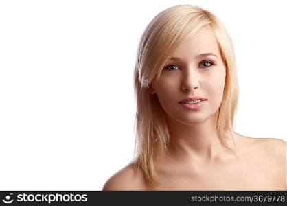 beauty close up portrait of a young blond haired woman over white touching her in a very sweet way her face