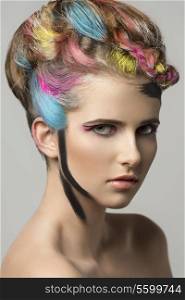 beauty close-up portrait of sensual girl with colorful painted hair-style and creative make-up, artistic style