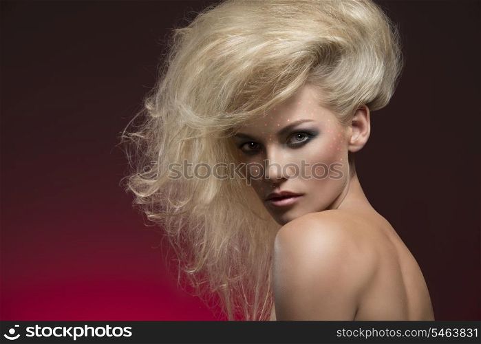 beauty close-up portrait of sensual girl with perfect skin, pretty make-up and modern blonde bushy hair-style