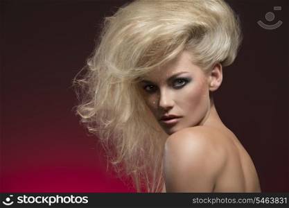 beauty close-up portrait of sensual girl with perfect skin, pretty make-up and modern blonde bushy hair-style