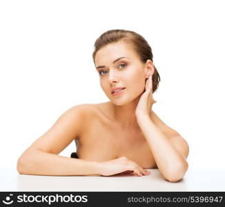 beauty concept - face and hands of beautiful woman with clean perfect skin