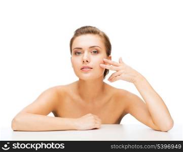 beauty concept - face of beautiful woman with clean perfect skin