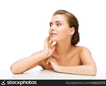 beauty concept - face of beautiful woman with clean perfect skin