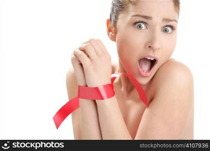 Beauty cosmetic portrait of funny tied hands woman with red tape