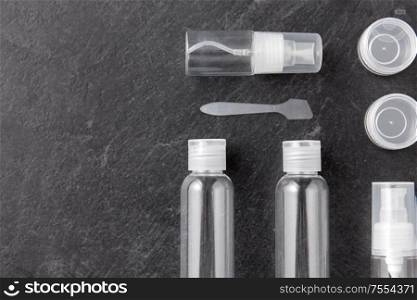 beauty, cosmetics and hygiene concept - toiletry bottle set for travel kit. toiletry bottle set