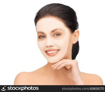 beauty, cosmetology, hydration, people and rejuvenation concept - beautiful young woman with collagen facial mask over white background. beautiful young woman with collagen facial mask