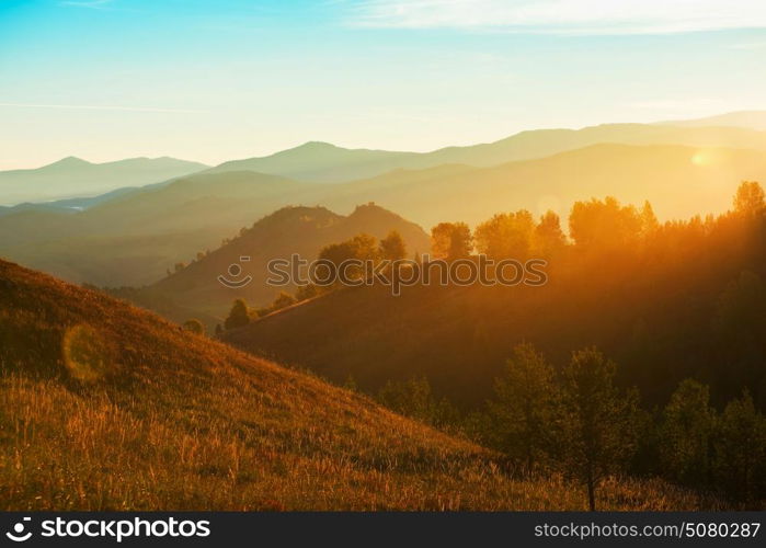 Beauty dawn in the mountains. Beauty dawn in the mountains in Altay, panoramic picture