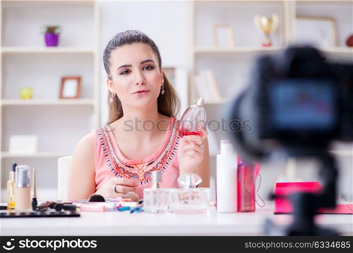 Beauty fashion blogger recording video for blog