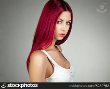 Beauty fashion model girl with colorful dyed hair. Girl with perfect makeup and hairstyle. Model brunette with perfect healthy dark hair