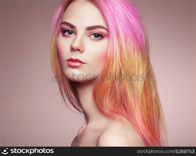 Beauty fashion model girl with colorful dyed hair. Girl with perfect makeup and hairstyle. Model with perfect healthy dyed hair