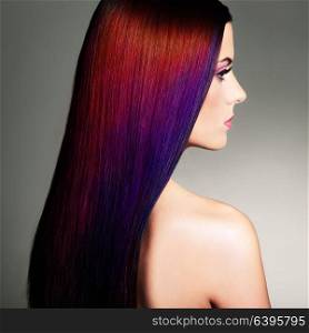 Beauty Fashion Model Girl with Colorful Dyed Hair. Girl with perfect Makeup and Hairstyle. Model with perfect Healthy Dyed Hair. Dark Hairstyles