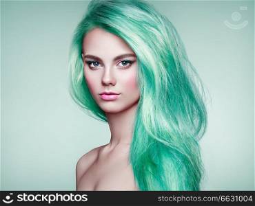 Beauty Fashion Model Girl with Colorful Dyed Hair. Girl with perfect Makeup and Hairstyle. Model with perfect Healthy Dyed Hair. Green Hair