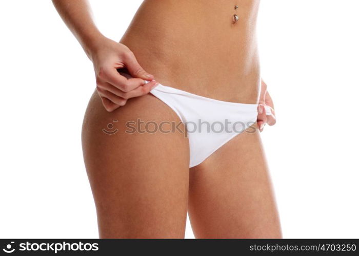 Beauty girl in white pants, isolated on a white background
