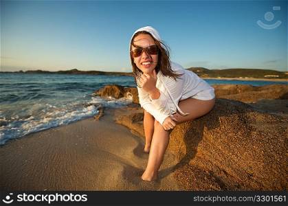 Beauty girl posing on the beach