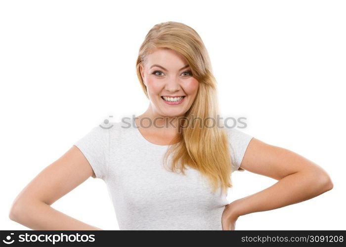 Beauty, happiness, joy concept. Portrait of happy smiling attractive young woman with beautiful blonde hair. Studio shot on white background. Portrait of happy smiling young blonde woman