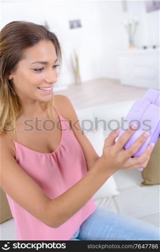beauty happy girl with valentine gift box