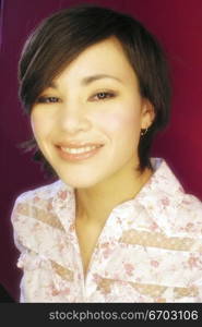 Beauty head shot of a younf woman.