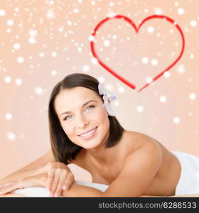 beauty, health, people and spa concept - beautiful young woman in spa