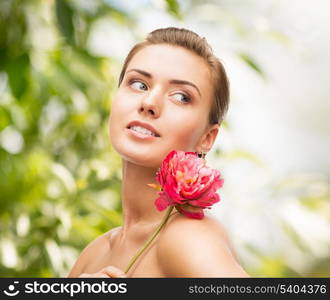 beauty, holidays and jewelry - woman with diamond earrings, ring and flower