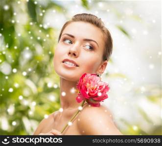 beauty, holidays, people and jewelry - woman with diamond earrings, ring and flower