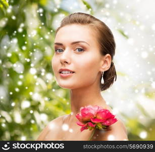 beauty, holidays, people and jewelry - woman with diamond earrings, ring and flower