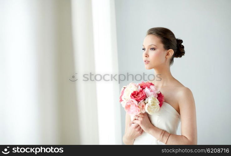 beauty, jewelry, people and luxury concept - beautiful asian woman or bride in white dress with peony flower, golden ring and bracelet