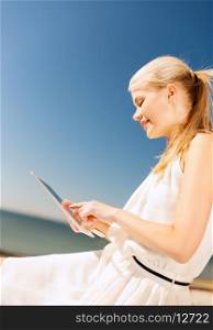 beauty, lifestyle and internet - young woman with tablet pc