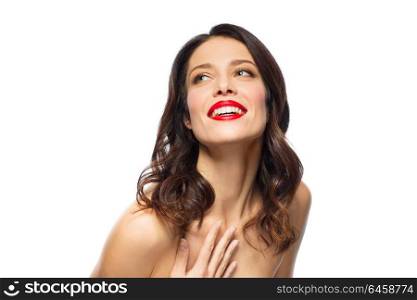 beauty, make up and people concept - happy smiling young woman with red lipstick posing over white background. beautiful smiling young woman with red lipstick