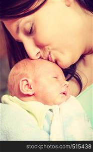 Beauty of parenting, motherhood love concept. Mother holding her little newborn baby. Mother holding her little newborn baby