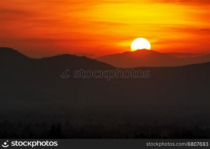 Beauty of the sun during the time sunset over the mountain range