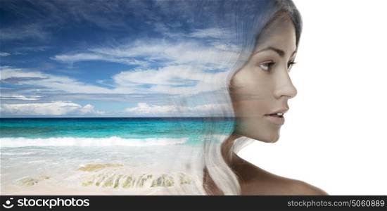 beauty people and eco concept - close up of beautiful young woman face over beach background. beautiful young woman face over beach background