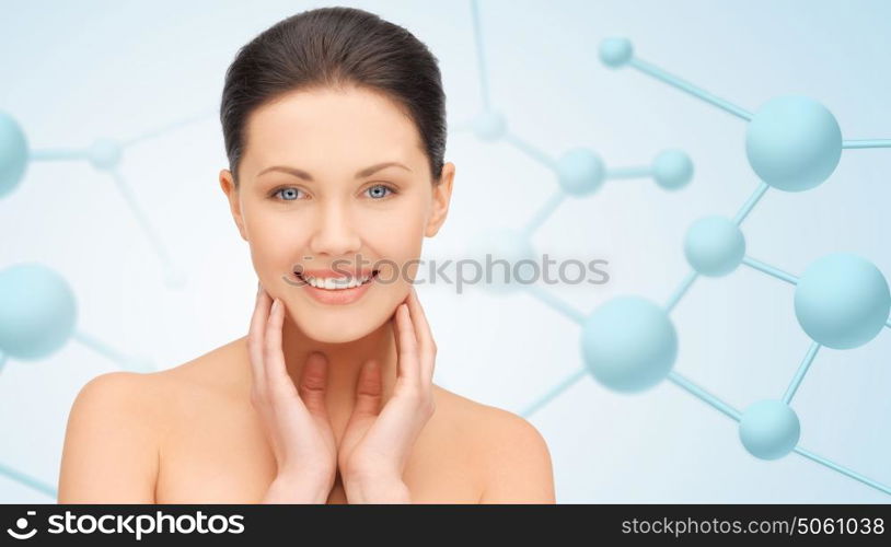 beauty, people and health concept - beautiful young woman face over blue background with molecules. beautiful young woman face with molecules