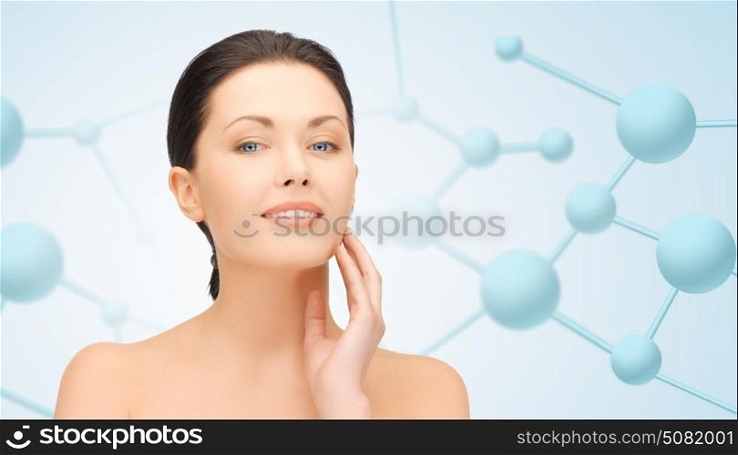 beauty, people and health concept - beautiful young woman face over blue background with molecules. beautiful young woman face with molecules