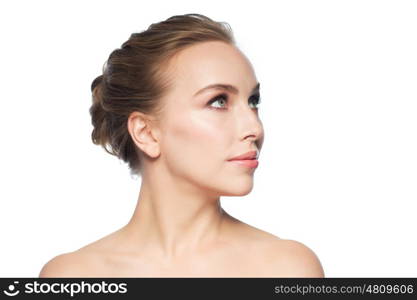 beauty, people and health concept - beautiful young woman face over white background