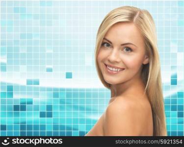 beauty, people and health concept - beautiful young woman with bare shoulders over blue background with squared grid